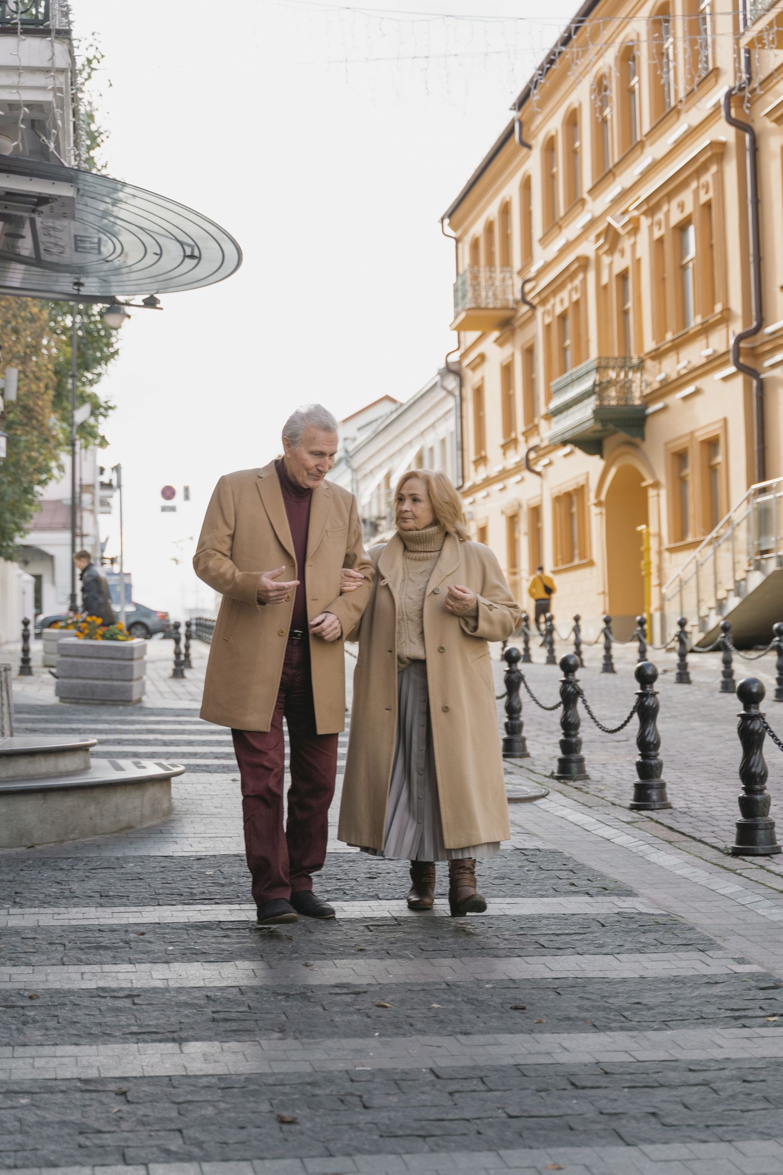 A couple aged 40 to 65 in the context of a French residential neighbourhood